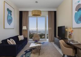 Living Room image for: Apartment - 1 bedroom - 2 bathrooms for rent in Avani Palm View Hotel & Suites - Dubai Media City - Dubai, Image 1