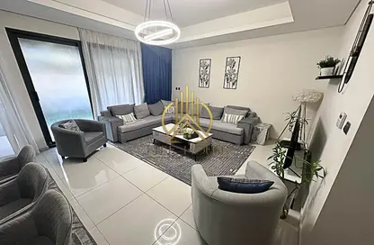 Living Room image for: Townhouse - 3 Bedrooms - 3 Bathrooms for rent in Aurum Villas - Sycamore - Damac Hills 2 - Dubai, Image 1
