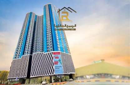 Outdoor Building image for: Apartment - 1 Bathroom for sale in Oasis Tower - Al Rashidiya 1 - Al Rashidiya - Ajman, Image 1