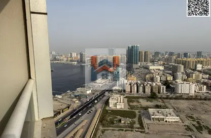 شقة - غرفة نوم - 2 حمامات للايجار في أورينت تاور 1 - أورينت تاور - البستان - عجمان