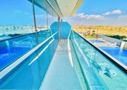 Pool image for: Apartment - 1 bedroom - 2 bathrooms for rent in Orchid Residence - Dubai Science Park - Dubai, Image 1
