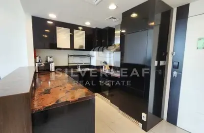 Kitchen image for: Apartment - 2 Bedrooms - 3 Bathrooms for rent in Bay's Edge - Business Bay - Dubai, Image 1