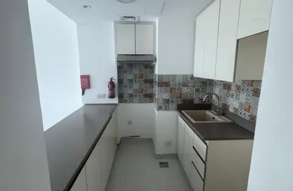 Apartment - 1 Bedroom - 2 Bathrooms for rent in Rabdan Building - Motor City - Dubai