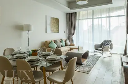 Living / Dining Room image for: Apartment - 1 Bedroom - 2 Bathrooms for rent in MINA by Azizi - Palm Jumeirah - Dubai, Image 1