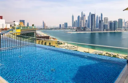 صورة لـ حوض سباحة شقة - 1 حمام للايجار في سيفين بالم - نخلة جميرا - دبي ، صورة رقم 1