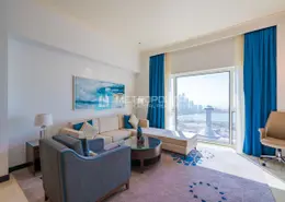 Living Room image for: Apartment - 2 Bedrooms - 3 Bathrooms for sale in Fairmont Marina Residences - The Marina - Abu Dhabi, Image 1