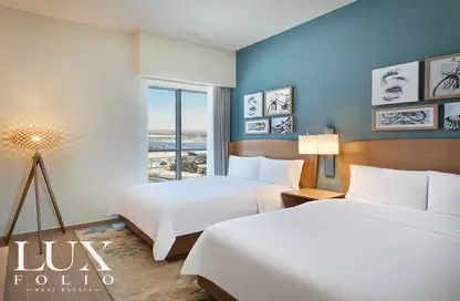 صورة لـ غرفة- غرفة النوم النزل و الشقق الفندقية - 2 غرف نوم - 2 حمامات للايجار في إليمنت لويستن - الجداف - دبي ، صورة رقم 1