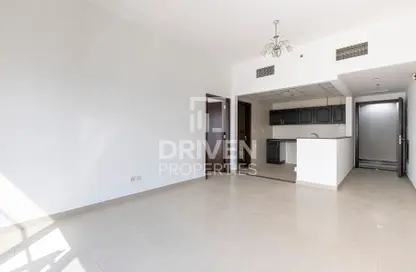 Empty Room image for: Apartment - 1 Bedroom - 2 Bathrooms for sale in Dana Tower - Jumeirah Village Circle - Dubai, Image 1