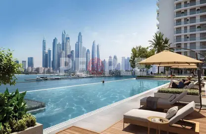 Pool image for: Apartment - 2 Bedrooms - 2 Bathrooms for sale in Palace Beach Residence - EMAAR Beachfront - Dubai Harbour - Dubai, Image 1