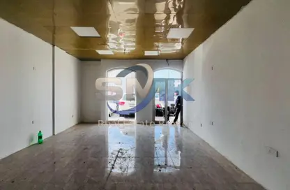 متجر - استوديو - 1 حمام للايجار في ز01 - طراز إنجليزي - المدينة العالمية - دبي