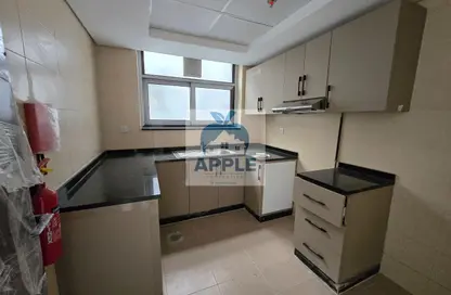 شقة - غرفة نوم - 2 حمامات للايجار في الزاهية - تجارية مويلح - الشارقة