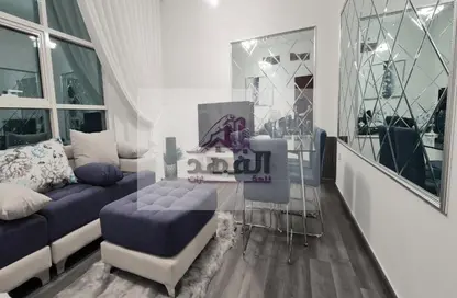 Living / Dining Room image for: Apartment - 1 Bedroom - 2 Bathrooms for rent in City Tower - Al Nuaimiya - Ajman, Image 1
