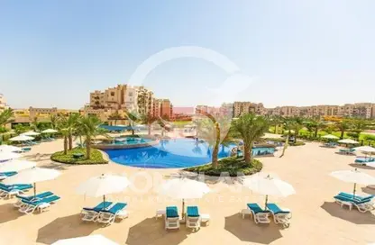 Pool image for: Apartment - 2 Bedrooms - 3 Bathrooms for sale in Al Thamam 57 - Al Thamam - Remraam - Dubai, Image 1