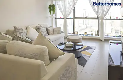 Living Room image for: Apartment - 1 Bedroom - 2 Bathrooms for sale in La Plage Tower - Al Mamzar - Sharjah - Sharjah, Image 1