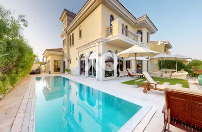 Pool image for: Villa - 4 Bedrooms - 5 Bathrooms for rent in Garden Homes Frond F - Garden Homes - Palm Jumeirah - Dubai, Image 1