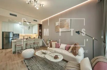 Living / Dining Room image for: Apartment - 1 Bedroom - 2 Bathrooms for sale in Vita Grande - Jumeirah Village Circle - Dubai, Image 1