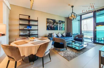 Living / Dining Room image for: Apartment - 2 Bedrooms - 2 Bathrooms for rent in Jumeirah Gate Tower 1 - The Address Jumeirah Resort and Spa - Jumeirah Beach Residence - Dubai, Image 1