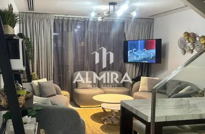Living / Dining Room image for: Duplex - 2 Bedrooms - 3 Bathrooms for sale in Oasis 1 - Oasis Residences - Masdar City - Abu Dhabi, Image 1