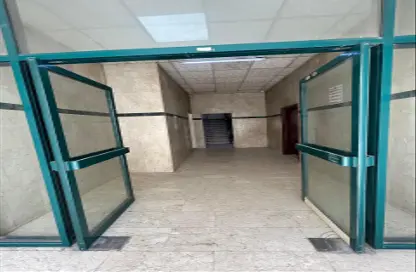 عمارة بالكامل - استوديو - 4 حمامات للبيع في تجارية مويلح - الشارقة