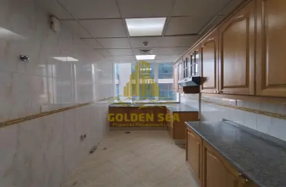 Kitchen image for: Apartment - 2 Bedrooms - 3 Bathrooms for rent in Khalidiya Street - Al Khalidiya - Abu Dhabi, Image 1