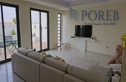 Living Room image for: Villa - 5 Bedrooms - 6 Bathrooms for sale in Aurum Villas - Juniper - Damac Hills 2 - Dubai, Image 1