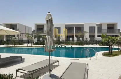 Pool image for: Villa - 4 Bedrooms - 4 Bathrooms for rent in Elan - Tilal Al Ghaf - Dubai, Image 1
