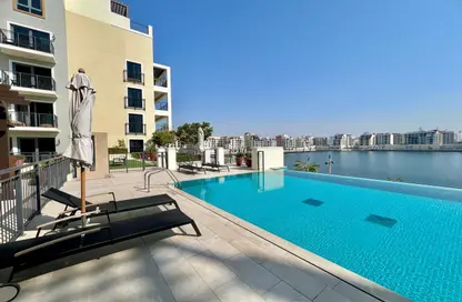 Pool image for: Apartment - 1 Bedroom - 1 Bathroom for sale in Le Pont - La Mer - Jumeirah - Dubai, Image 1