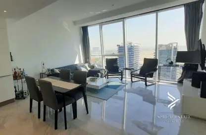 Living / Dining Room image for: Apartment - 1 Bedroom - 1 Bathroom for sale in The Pad - Business Bay - Dubai, Image 1