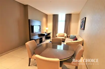 Living / Dining Room image for: Hotel  and  Hotel Apartment - 2 Bedrooms - 2 Bathrooms for rent in Royal Continental Suites - Business Bay - Dubai, Image 1