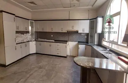Kitchen image for: Villa - 5 Bedrooms - 6 Bathrooms for rent in Hoshi - Al Badie - Sharjah, Image 1