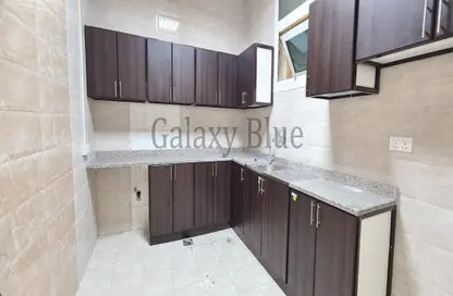Kitchen image for: Apartment - 2 Bedrooms - 2 Bathrooms for rent in Mohamed Bin Zayed Centre - Mohamed Bin Zayed City - Abu Dhabi, Image 1