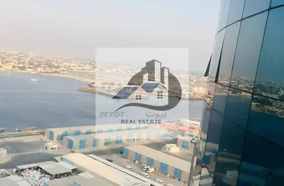 شقة - غرفة نوم - 2 حمامات للايجار في أورينت تاور 1 - أورينت تاور - البستان - عجمان