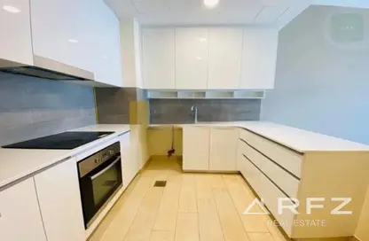 Kitchen image for: Apartment - 1 Bedroom - 2 Bathrooms for rent in Genesis by Meraki - Arjan - Dubai, Image 1