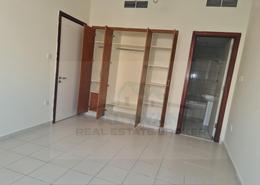 Empty Room image for: Apartment - 1 bedroom - 2 bathrooms for rent in N10 - Persia Cluster - International City - Dubai, Image 1