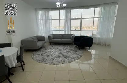 شقة - غرفة نوم - 2 حمامات للبيع في أورينت تاور 1 - أورينت تاور - البستان - عجمان