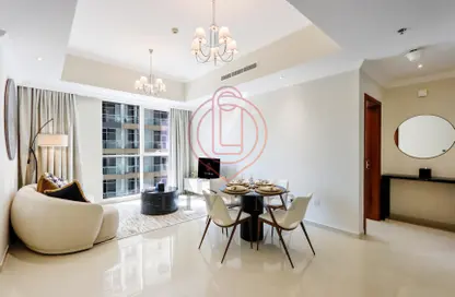 Living / Dining Room image for: Apartment - 1 Bedroom - 2 Bathrooms for rent in Dunya Tower - Burj Khalifa Area - Downtown Dubai - Dubai, Image 1