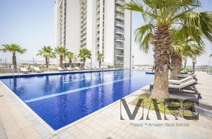 Pool image for: Apartment - 1 Bedroom - 1 Bathroom for sale in Golf Vita A - Golf Vita - DAMAC Hills - Dubai, Image 1
