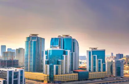 شقة - غرفة نوم - 2 حمامات للبيع في أورينت تاور 1 - أورينت تاور - البستان - عجمان