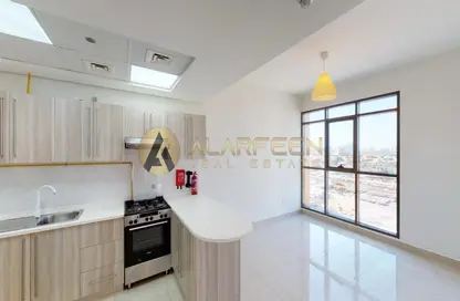 Kitchen image for: Apartment - 2 Bedrooms - 2 Bathrooms for sale in Green Diamond 1 B - Green Diamond 1 - Arjan - Dubai, Image 1