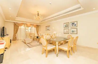 Living / Dining Room image for: Apartment - 2 Bedrooms - 3 Bathrooms for sale in Kempinski Palm Residence - The Crescent - Palm Jumeirah - Dubai, Image 1