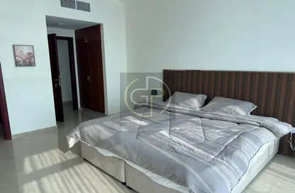 Room / Bedroom image for: Apartment - 1 Bedroom - 2 Bathrooms for rent in Ajman Corniche Residences - Ajman Corniche Road - Ajman, Image 1
