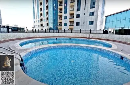 شقة - غرفة نوم - 2 حمامات للبيع في أورينت تاور 1 - أورينت تاور - البستان - عجمان