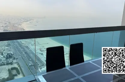 Apartment - 1 Bedroom - 2 Bathrooms for rent in Corniche Tower - Ajman Corniche Road - Ajman