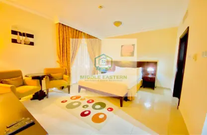 Room / Bedroom image for: Apartment - 1 Bathroom for rent in Al Wahda - Abu Dhabi, Image 1