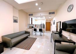 صورةغرفة المعيشة لـ: Studio - 1 حمام للكراء في دار الجوهرة - قرية الجميرا سركل - دبي, صورة 1