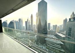 Balcony image for: Apartment - 1 bedroom - 2 bathrooms for rent in Burj Daman - DIFC - Dubai, Image 1