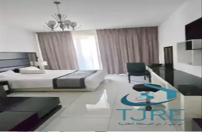 Room / Bedroom image for: Apartment - 1 Bathroom for sale in Giovanni Boutique Suites - Dubai Sports City - Dubai, Image 1