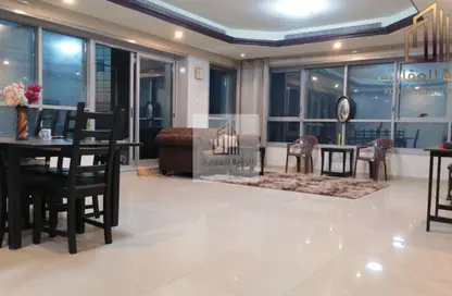 Living / Dining Room image for: Apartment - 2 Bedrooms - 3 Bathrooms for sale in Cornish Tower - Al Rumaila - Ajman, Image 1