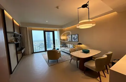 Living / Dining Room image for: Apartment - 1 Bedroom - 2 Bathrooms for sale in The Address Residences Dubai Opera Tower 1 - The Address Residences Dubai Opera - Downtown Dubai - Dubai, Image 1