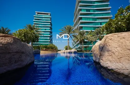 Pool image for: Apartment - 1 Bedroom - 2 Bathrooms for rent in Al Naseem Residences B - Al Bandar - Al Raha Beach - Abu Dhabi, Image 1